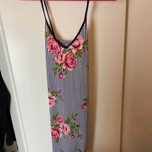 Mid length dress with small slit